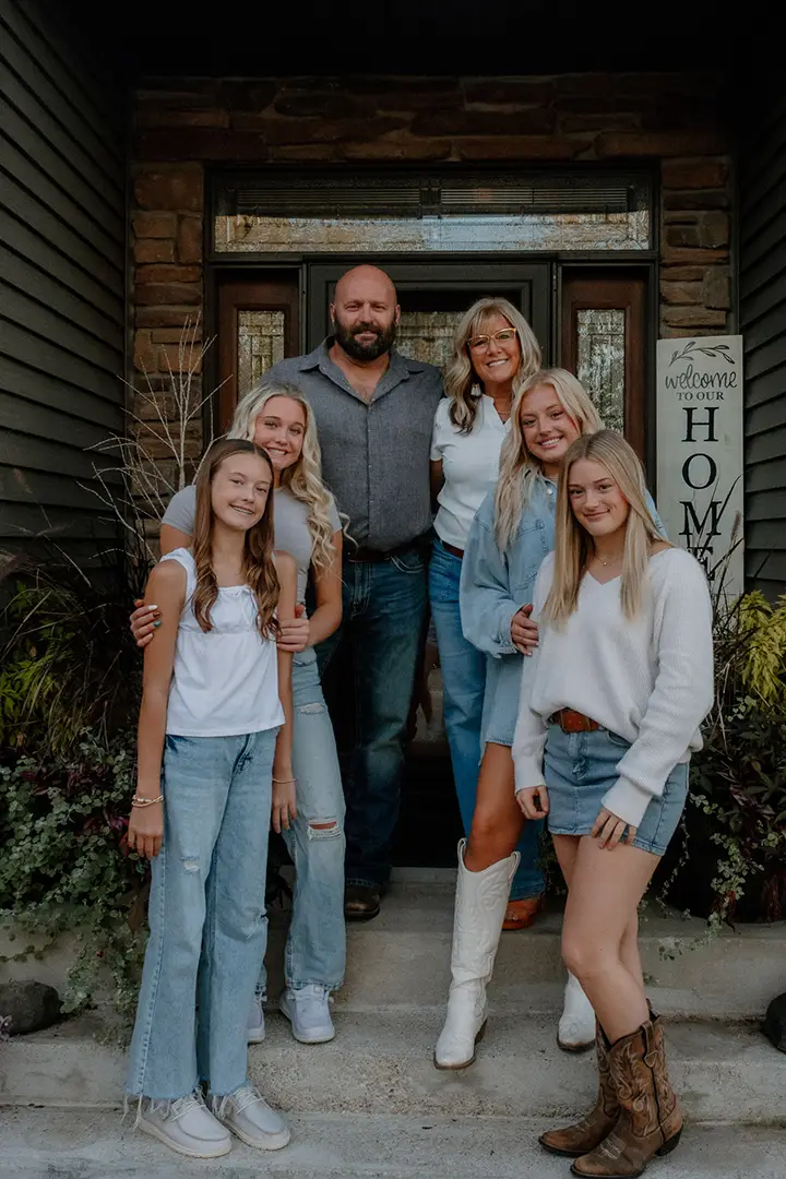Portrait of Janelle Lauersdorf and family